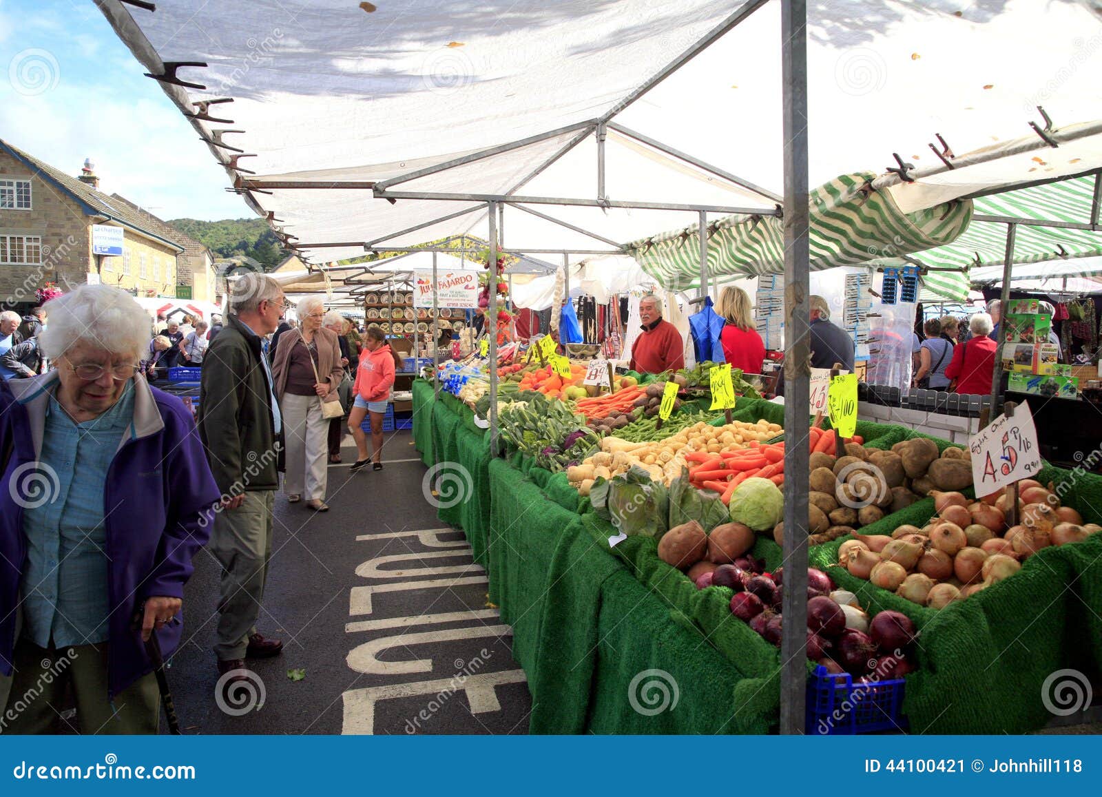 Fruit &amp; veg. market stall. A busy fruit and vegetable market stall on Bakewell Monday market in Derbyshire, England, UK.