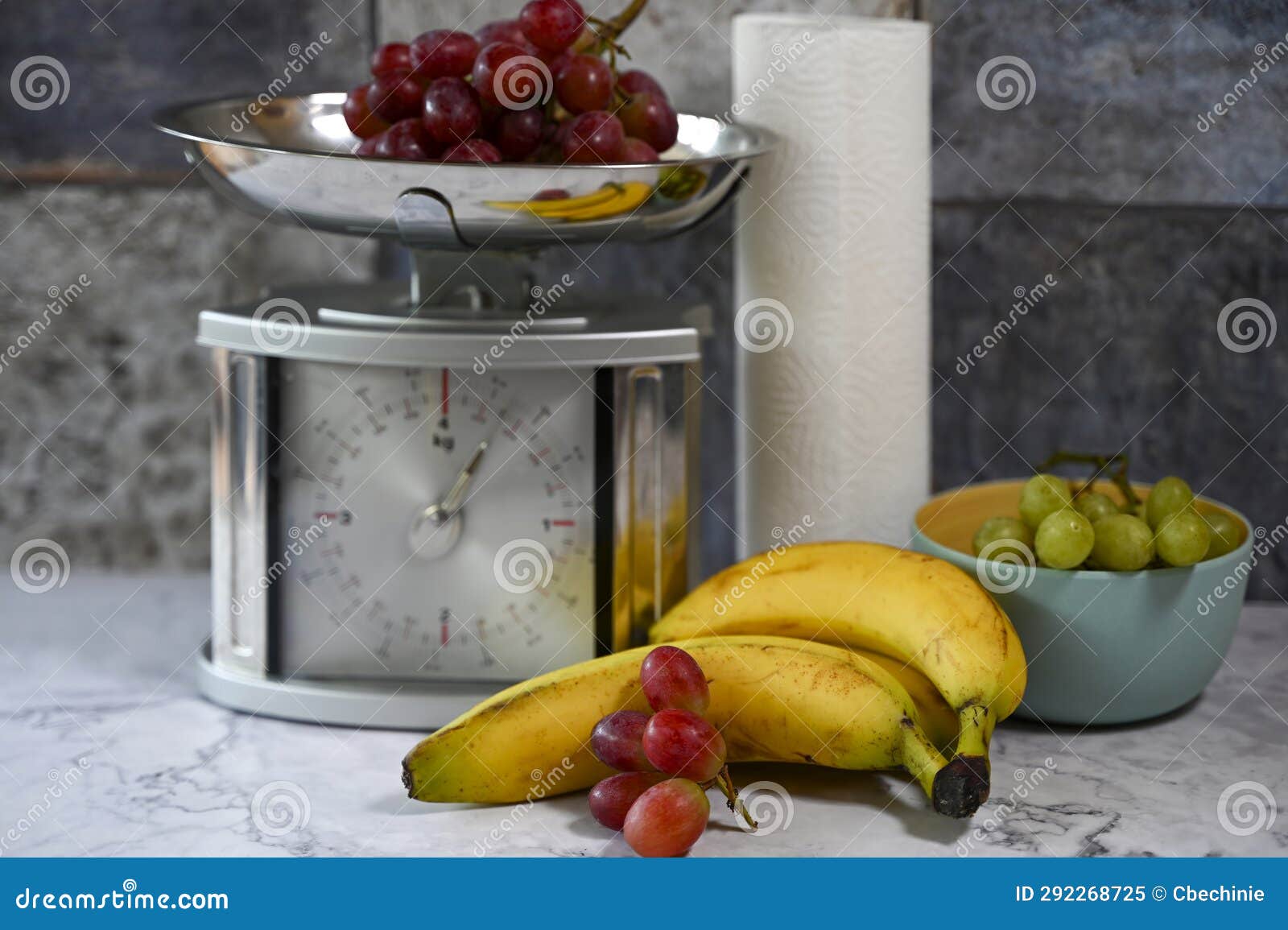 Fruits on a Kitchen Countertop and on a Kitchen Scale Stock Image