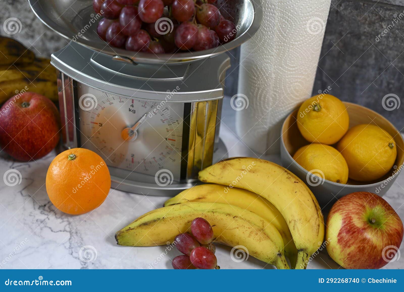 Fruits on a Kitchen Countertop Near a Kitchen Scale Stock Photo Image