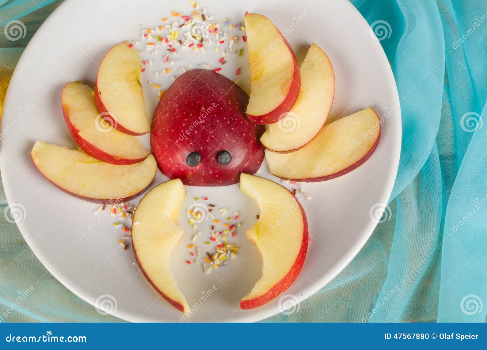 Fruity kid dessert. Fruity dessert in the shape of a crab, a creative dessert for children