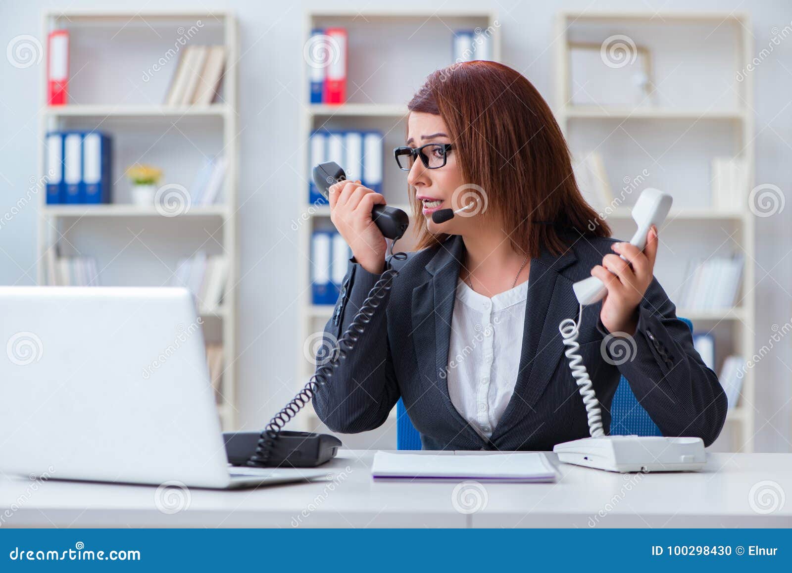 The frustrated call center assistant responding to calls