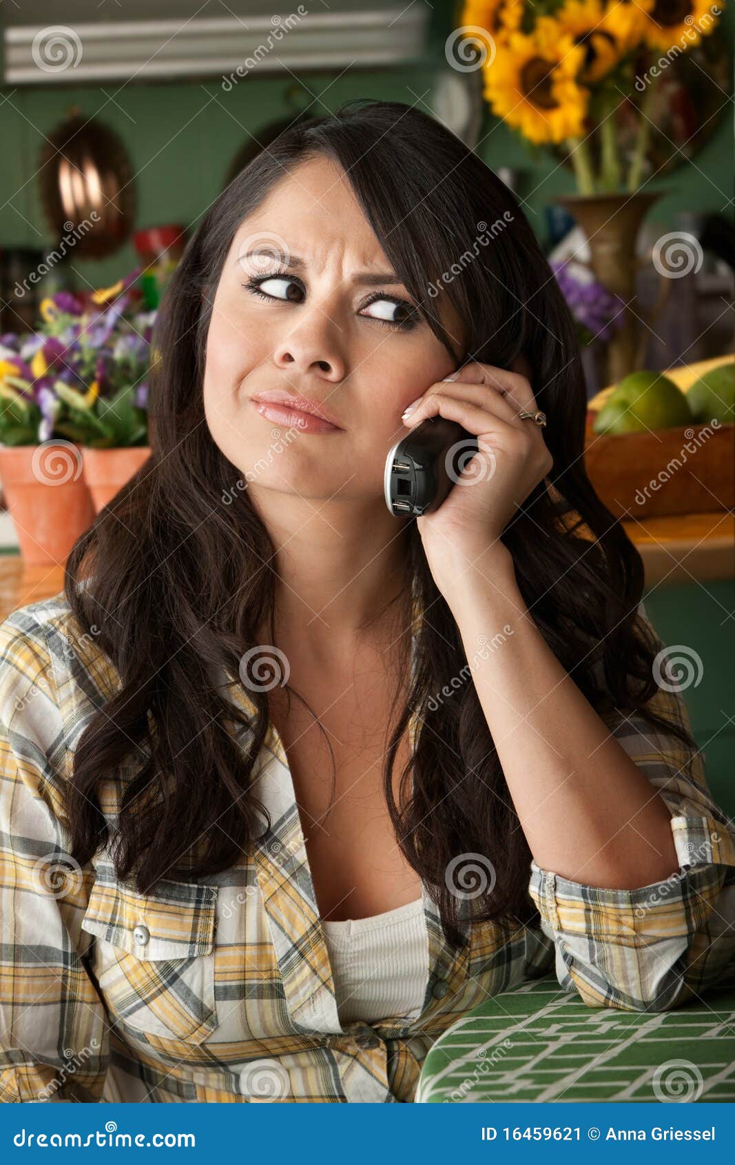 frustrated latina woman on phone
