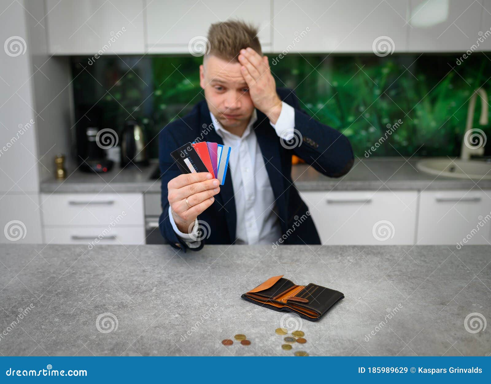 frustrated man in heavy credit card debt