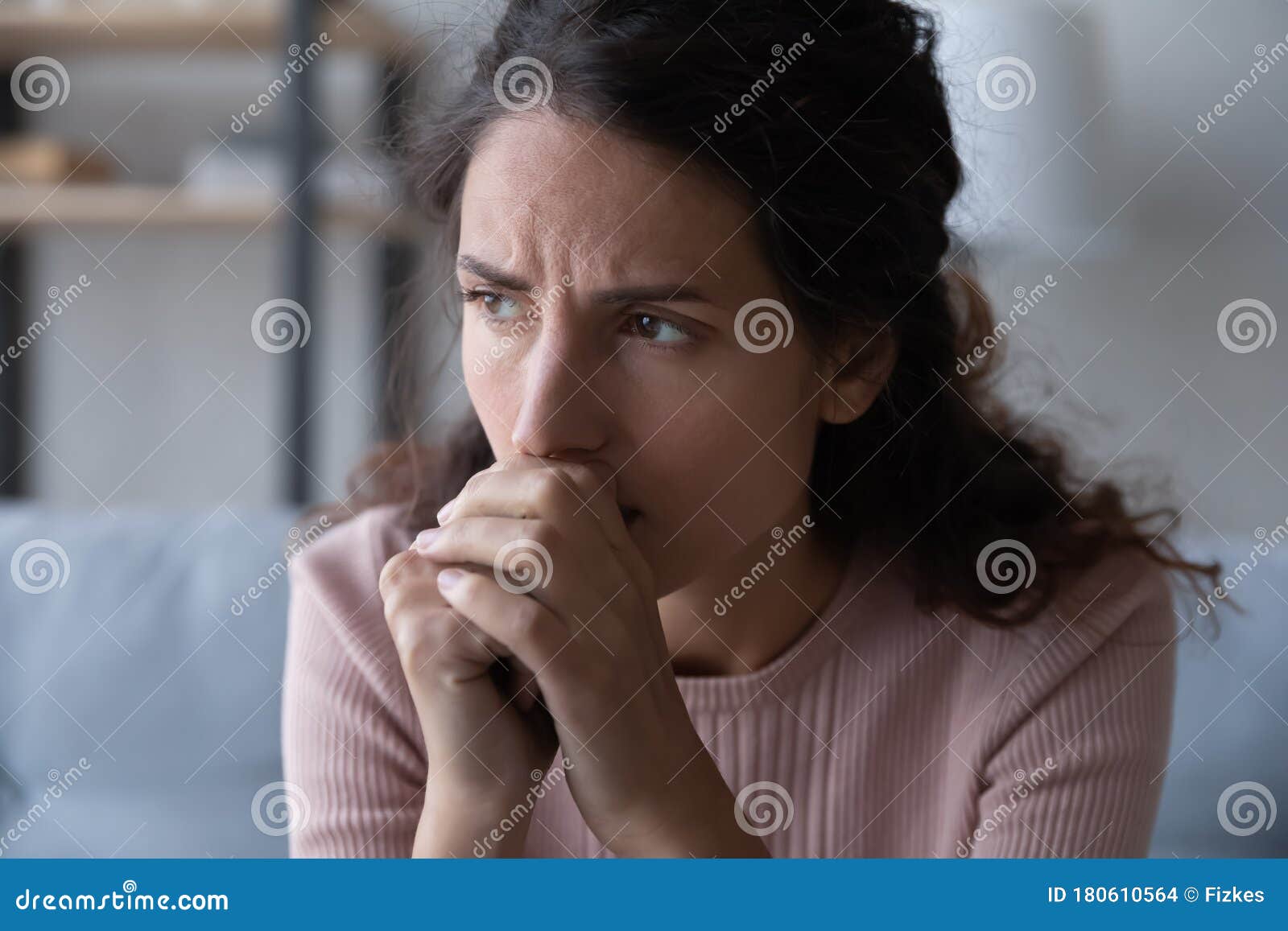 frustrated stressed young woman thinking of difficult decision.