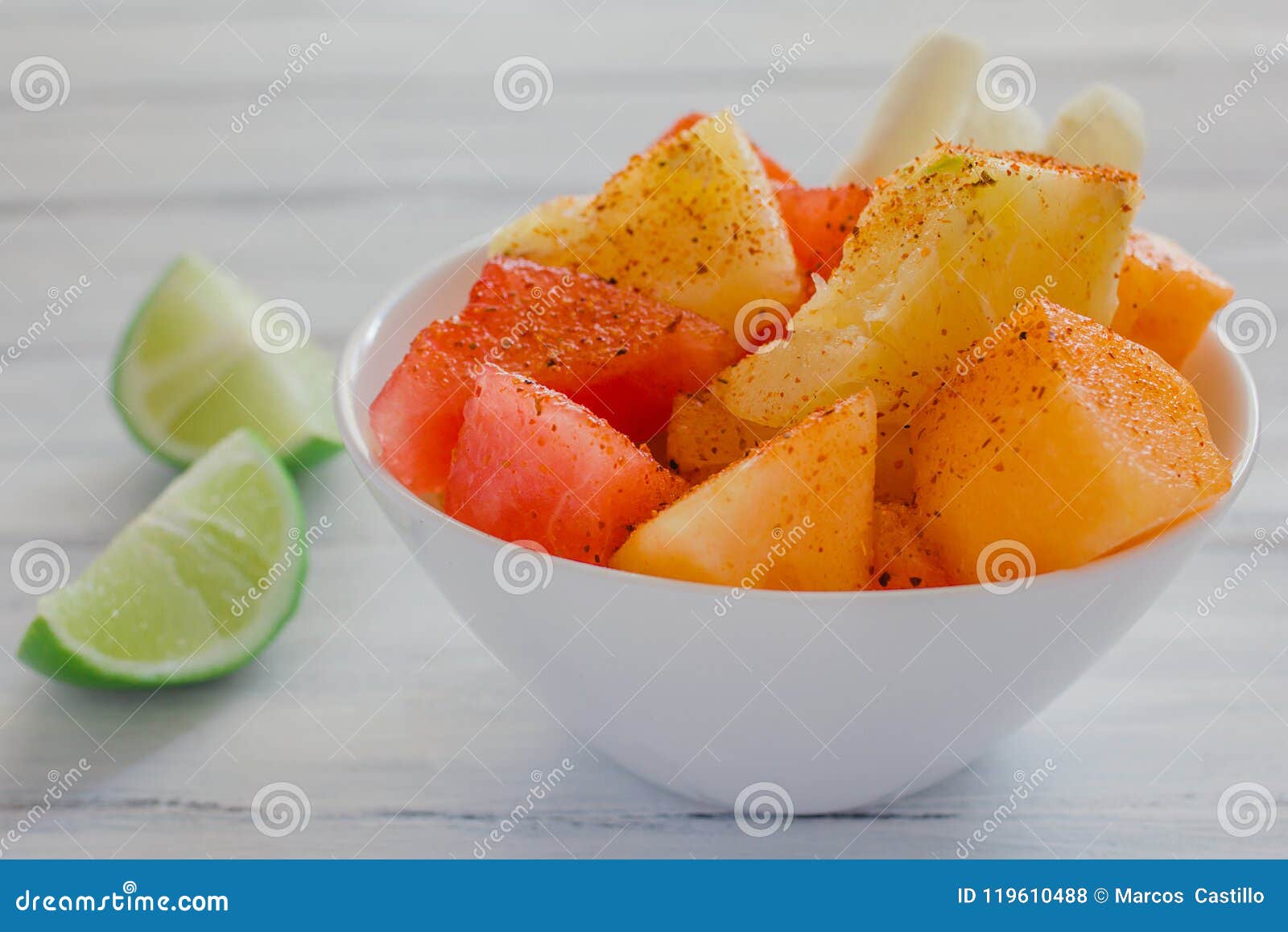 fruta con chile, mexican snack bowl of healthy fresh fruit salad