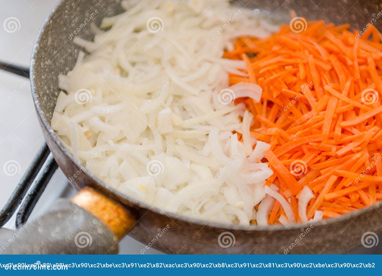 Fry Onions and Carrots. Onions and Carrots in a Pan. Cooking Vegetables