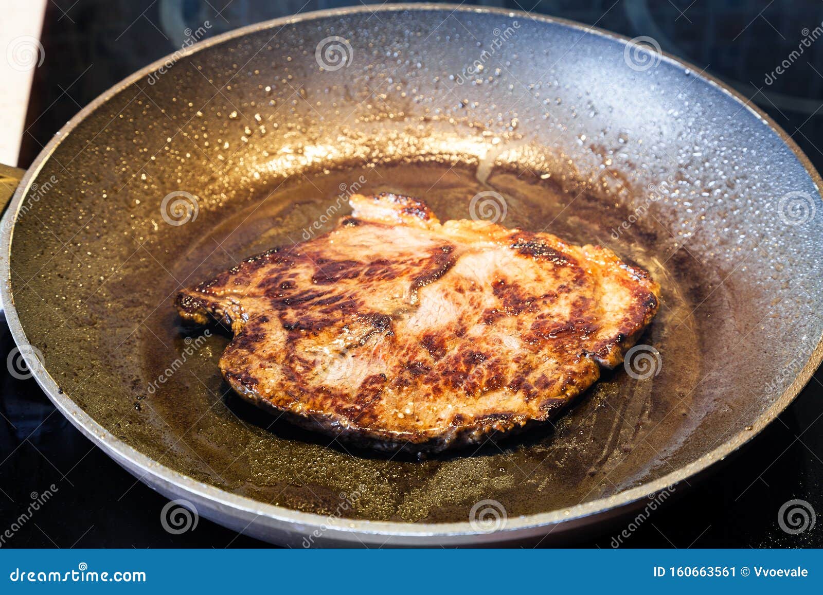 Frying Beef Steak in Pan on Ceramic Electric Range Stock Image Image of stove, prepare 160663561