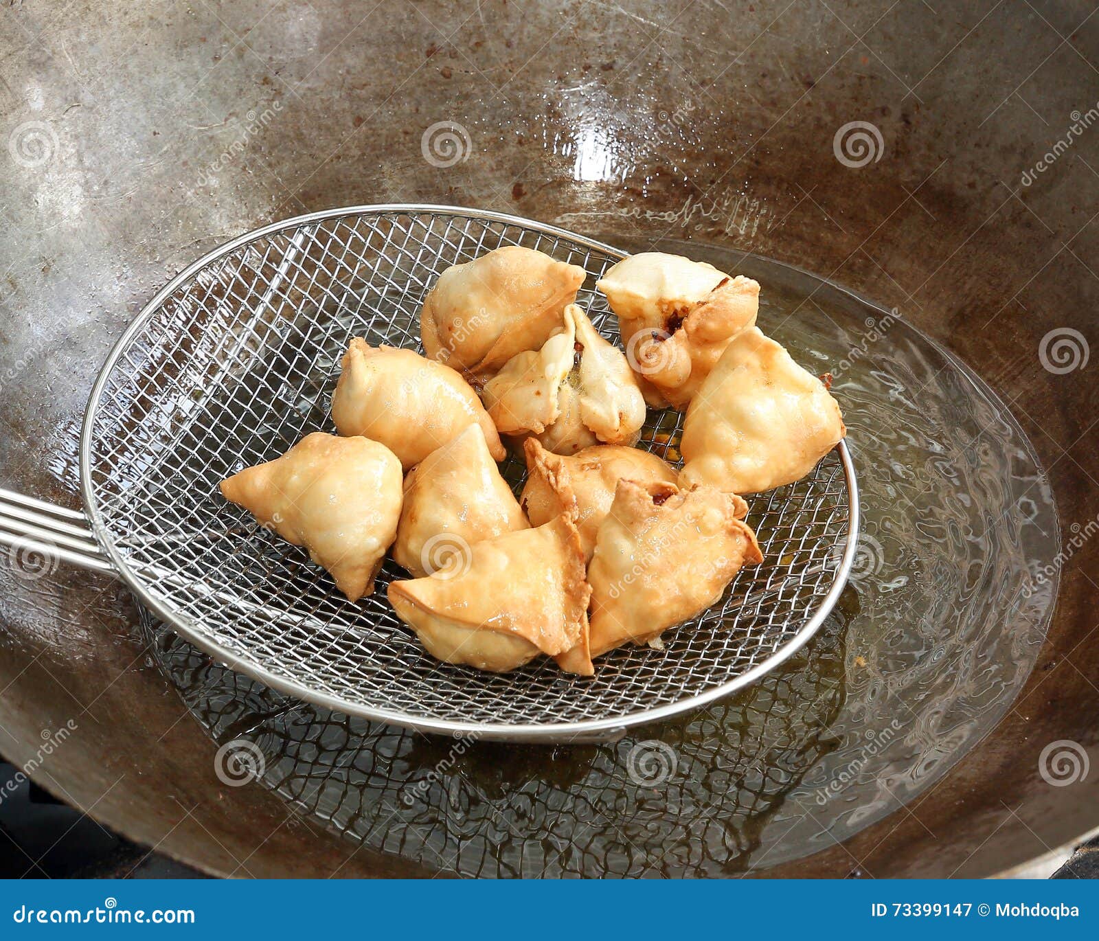 Frying cooking samosa stock image. Image of boiling, cooking 73399147