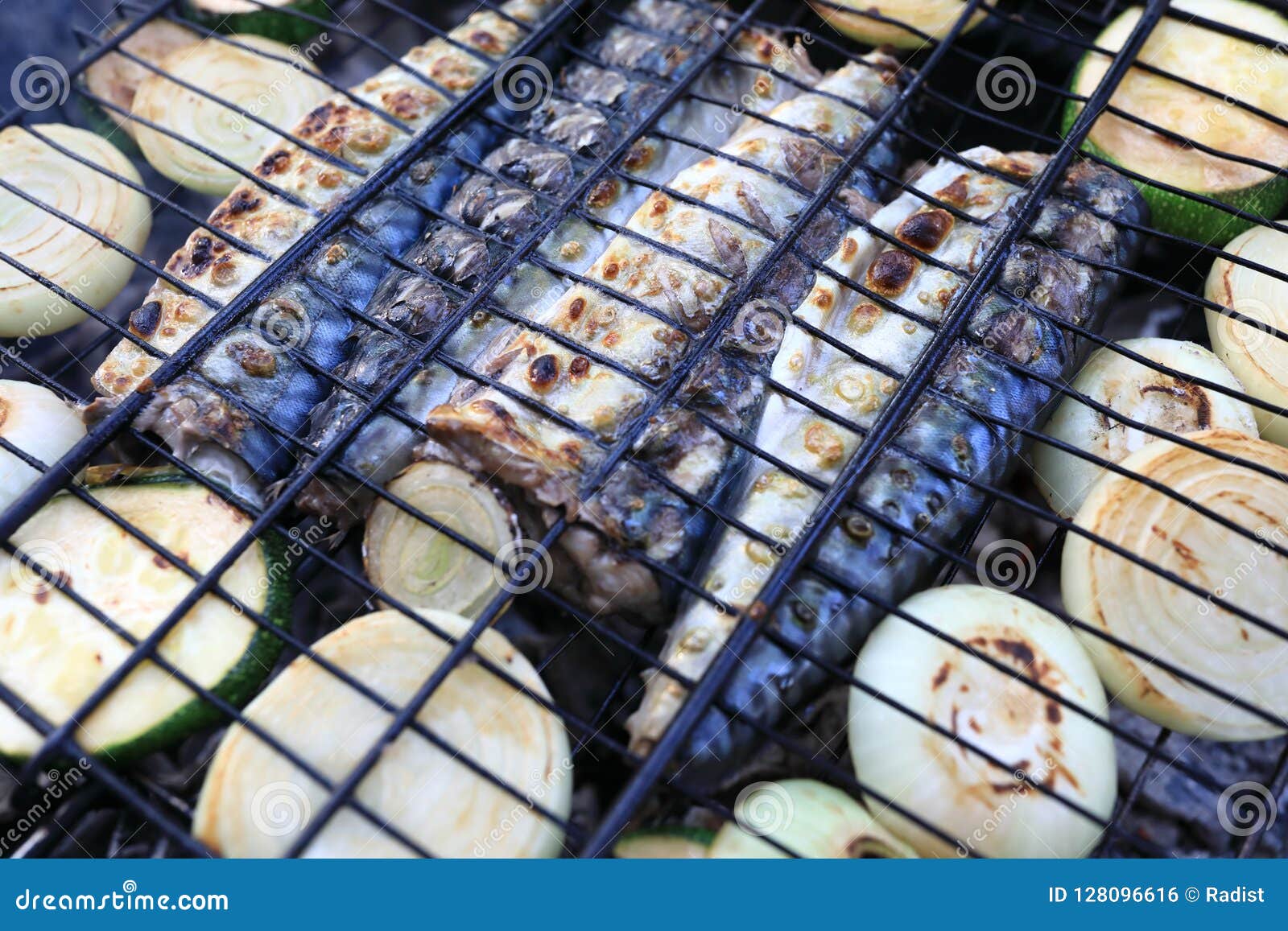 Frying mackerel on grill stock photo. Image of cook 128096616