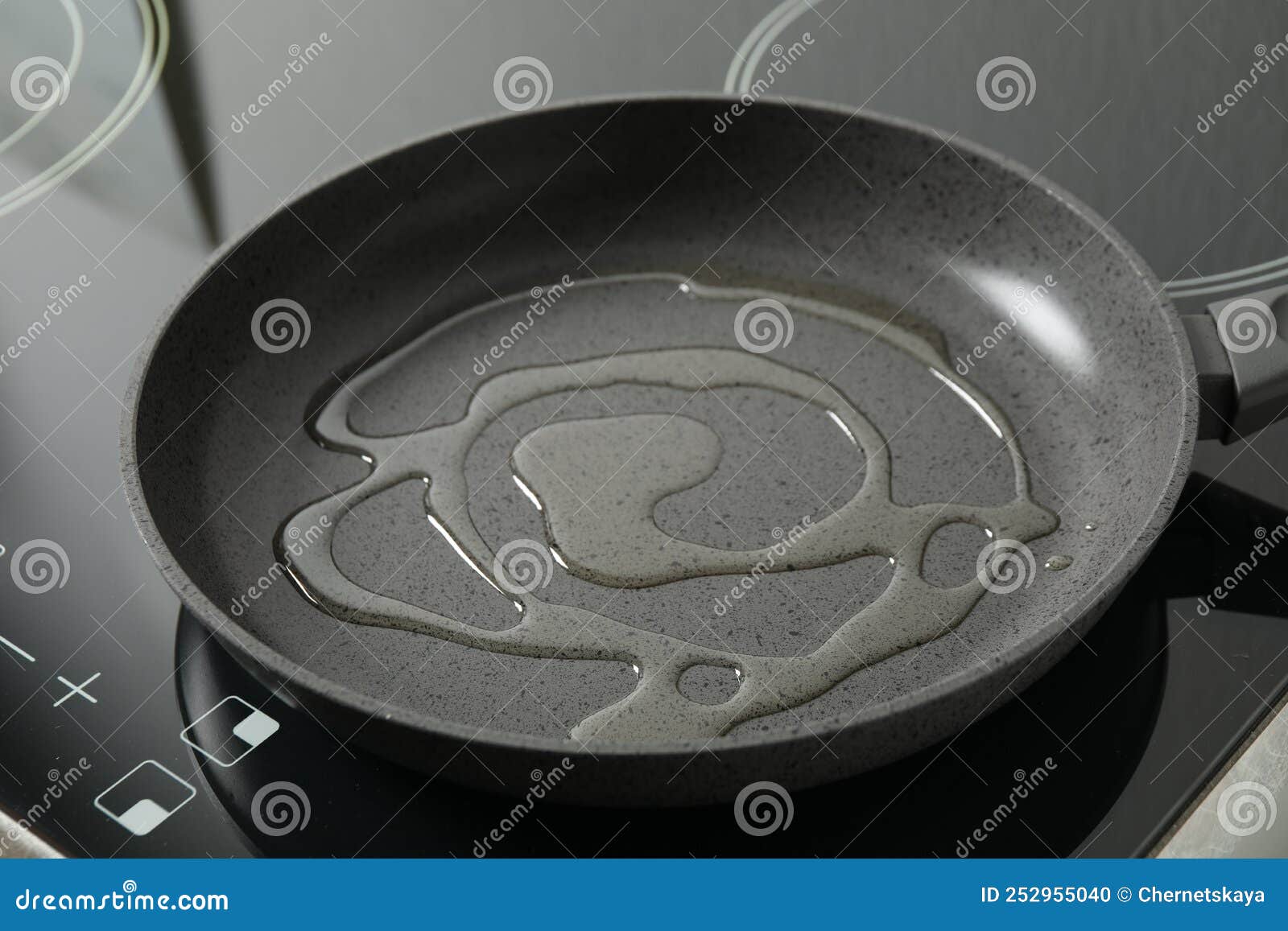 Frying Pan with Cooking Oil on Induction Stove Stock Photo Image of
