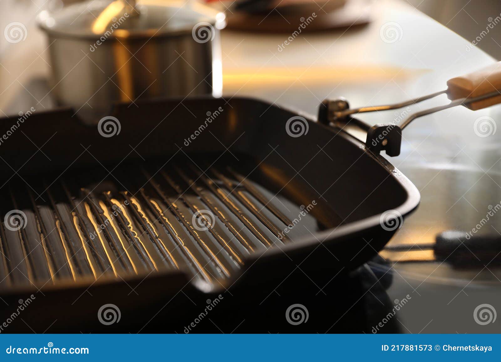 Frying Pan with Cooking Oil on Stove Stock Image Image of background