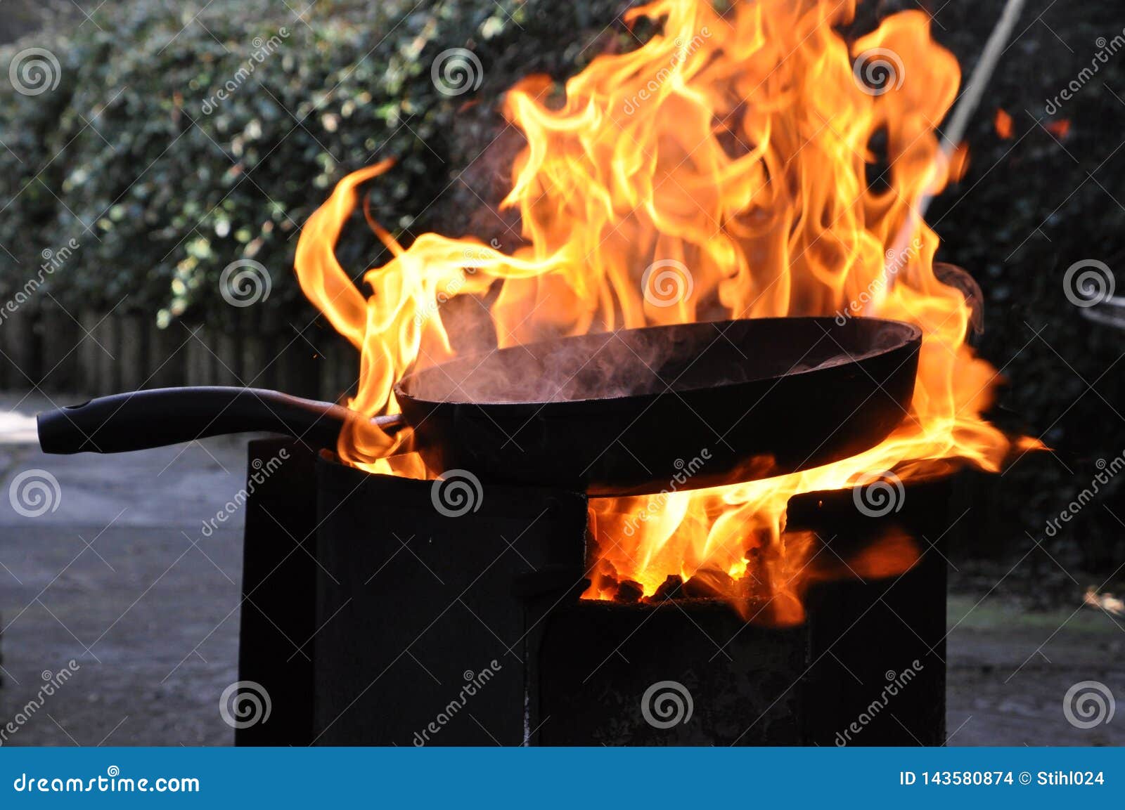 Frying Pan On Open Fire Place With Burning Flames Stock Photo Image