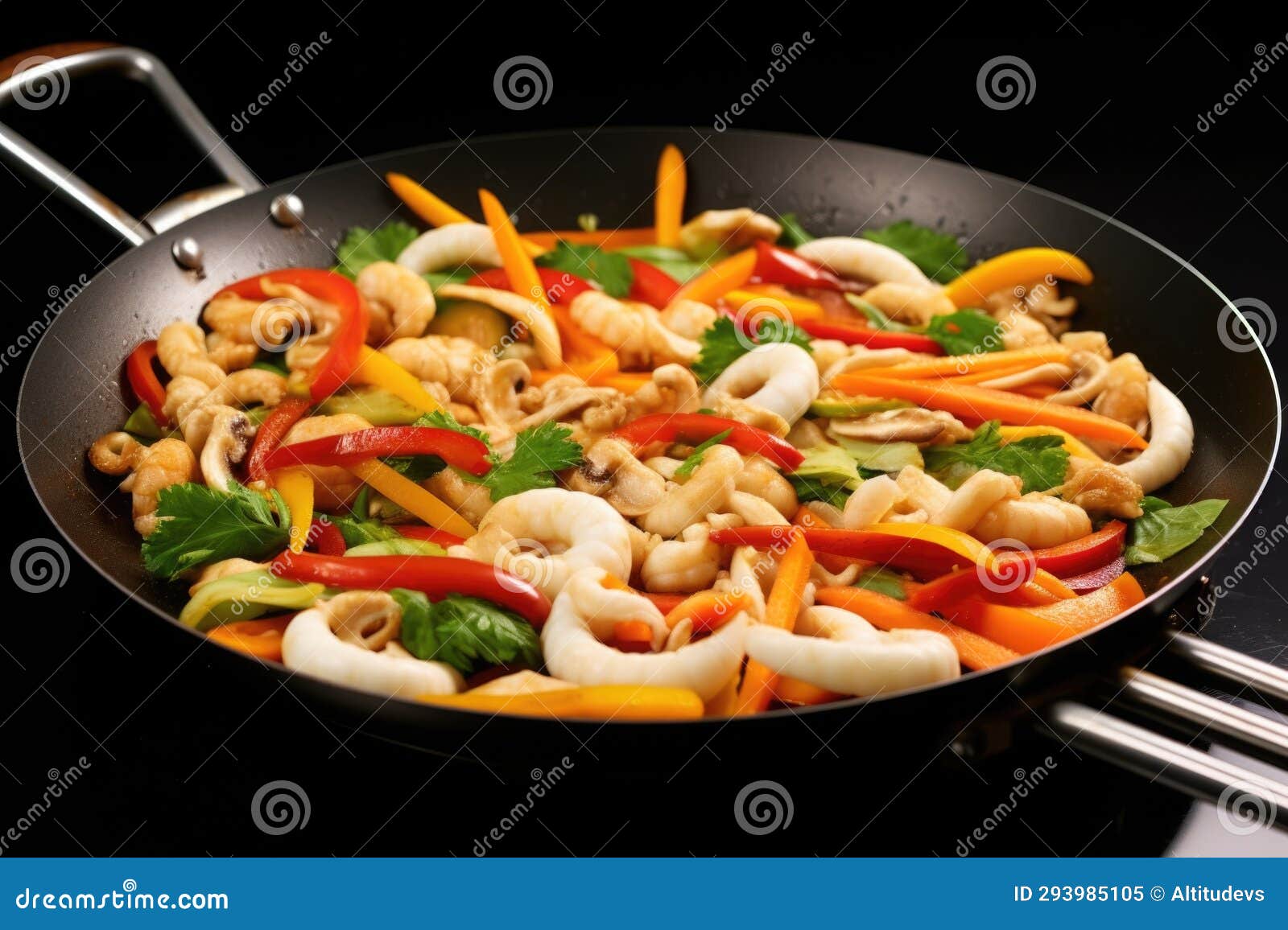 Frying Pan Showing Stir-fried Squid Rings and Vegetables Stock Image