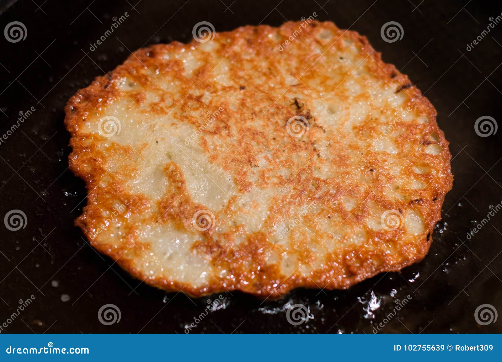 frying potato pancakes, latkes or boxties