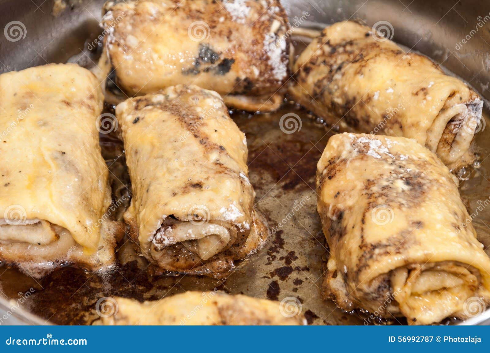 Frying Rolled Stuffed Pancakes in Hot Oil Stock Image Image of