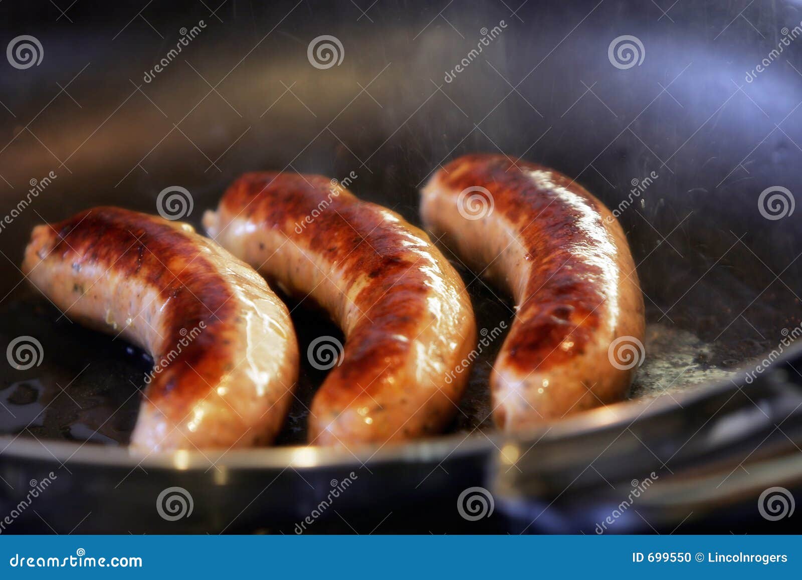 sausages frying
