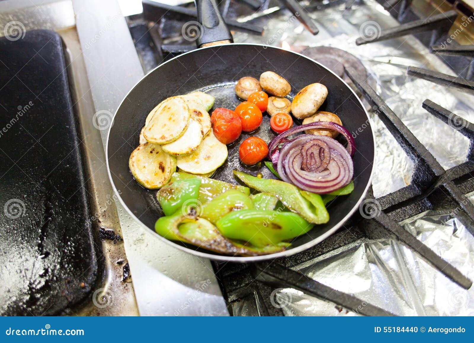 Frying vegetables on oil stock photo. Image of vegan 55184440