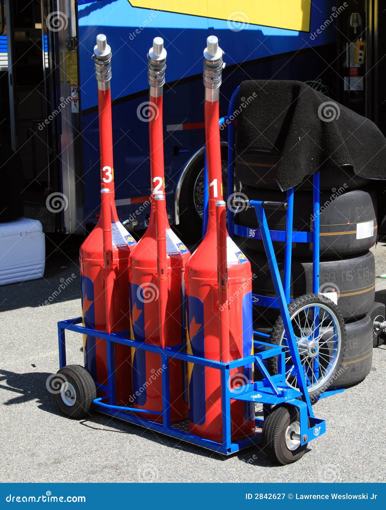 Fuel cans and tires stock image. Image of rubber, scenes 2842627