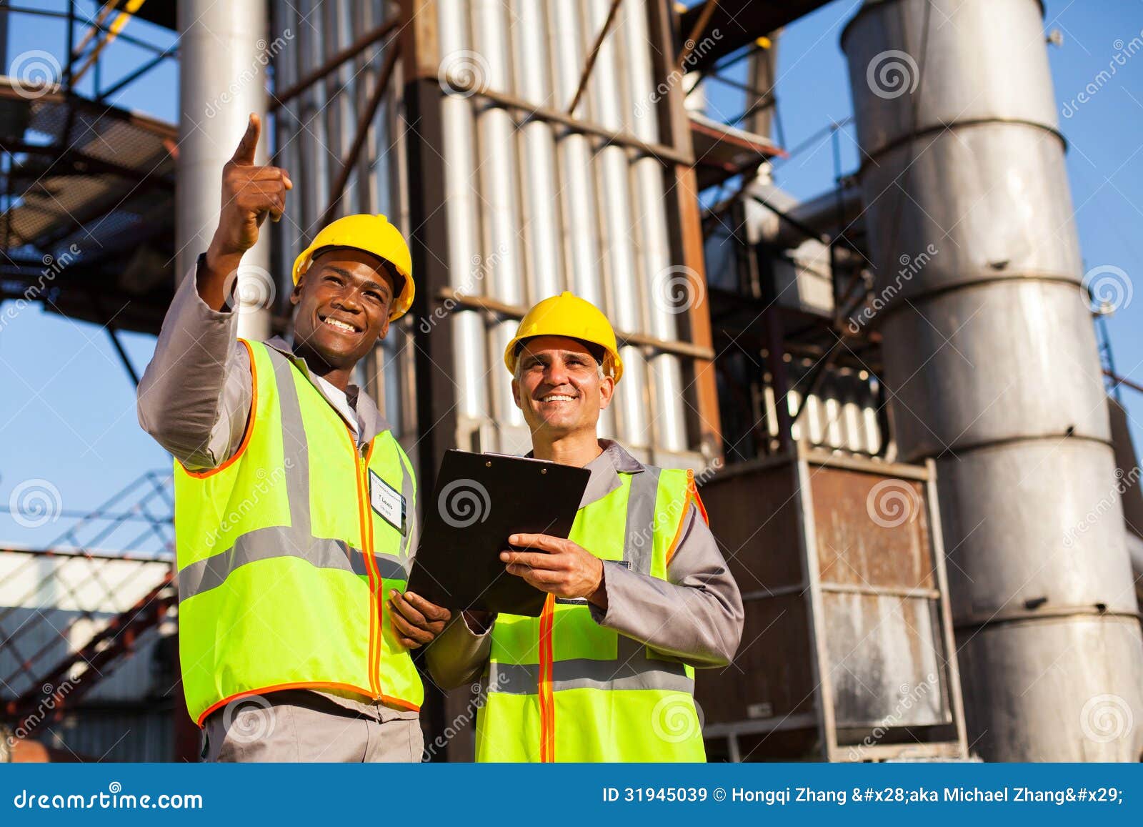 Fuel chemical workers stock image. Image of mature, pointing 31945039