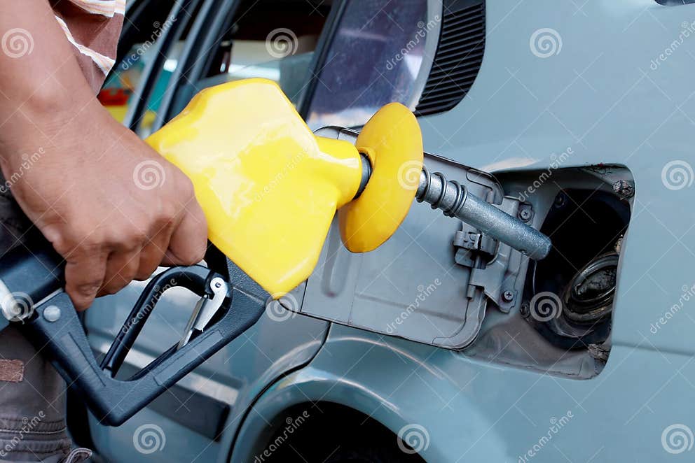 Fuel filling stock image. Image of benzine, fuel, hand 14434969