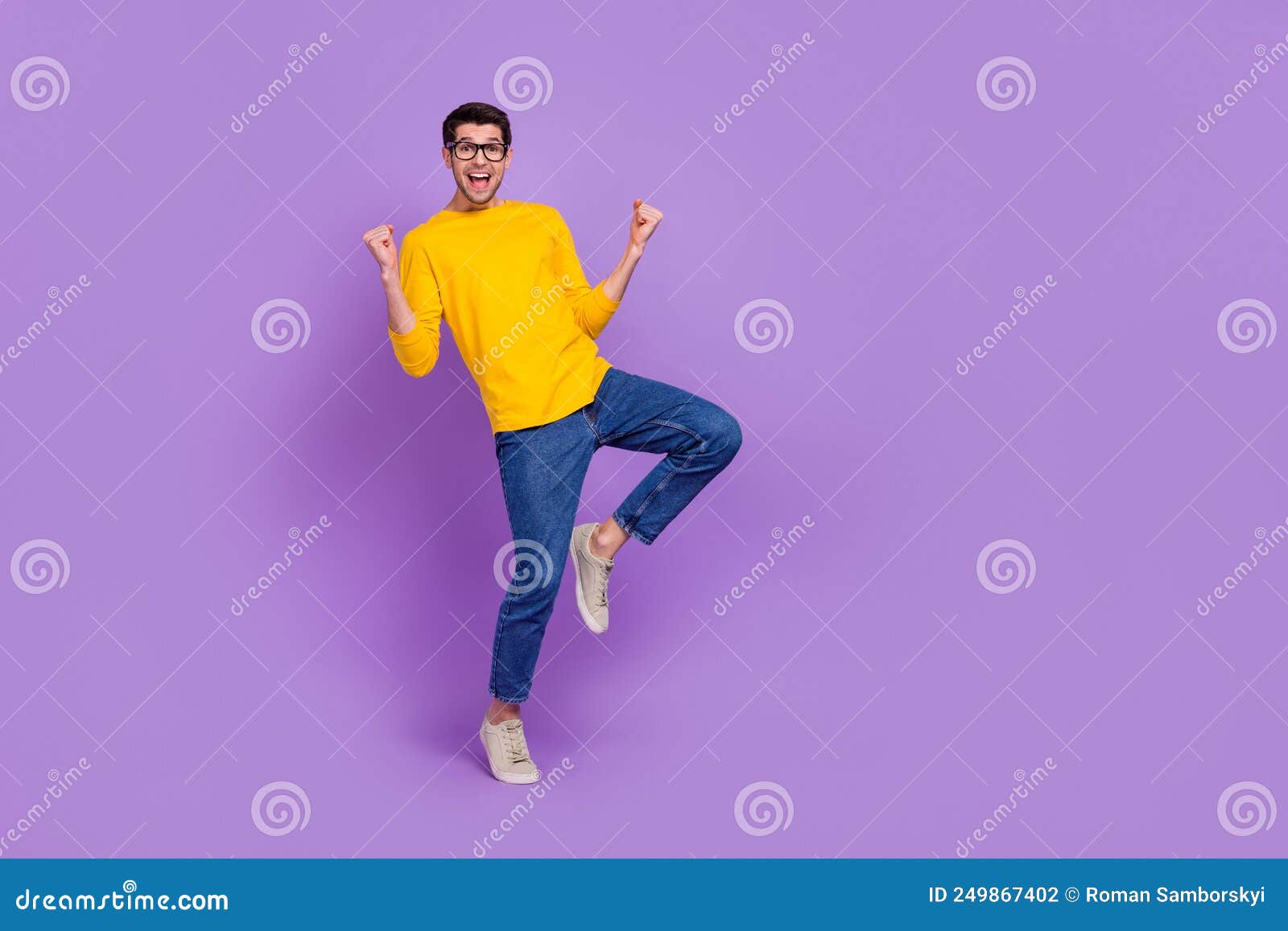 Full Body Image of Cheerful Overjoyed Laughing Man Raise Fists in ...