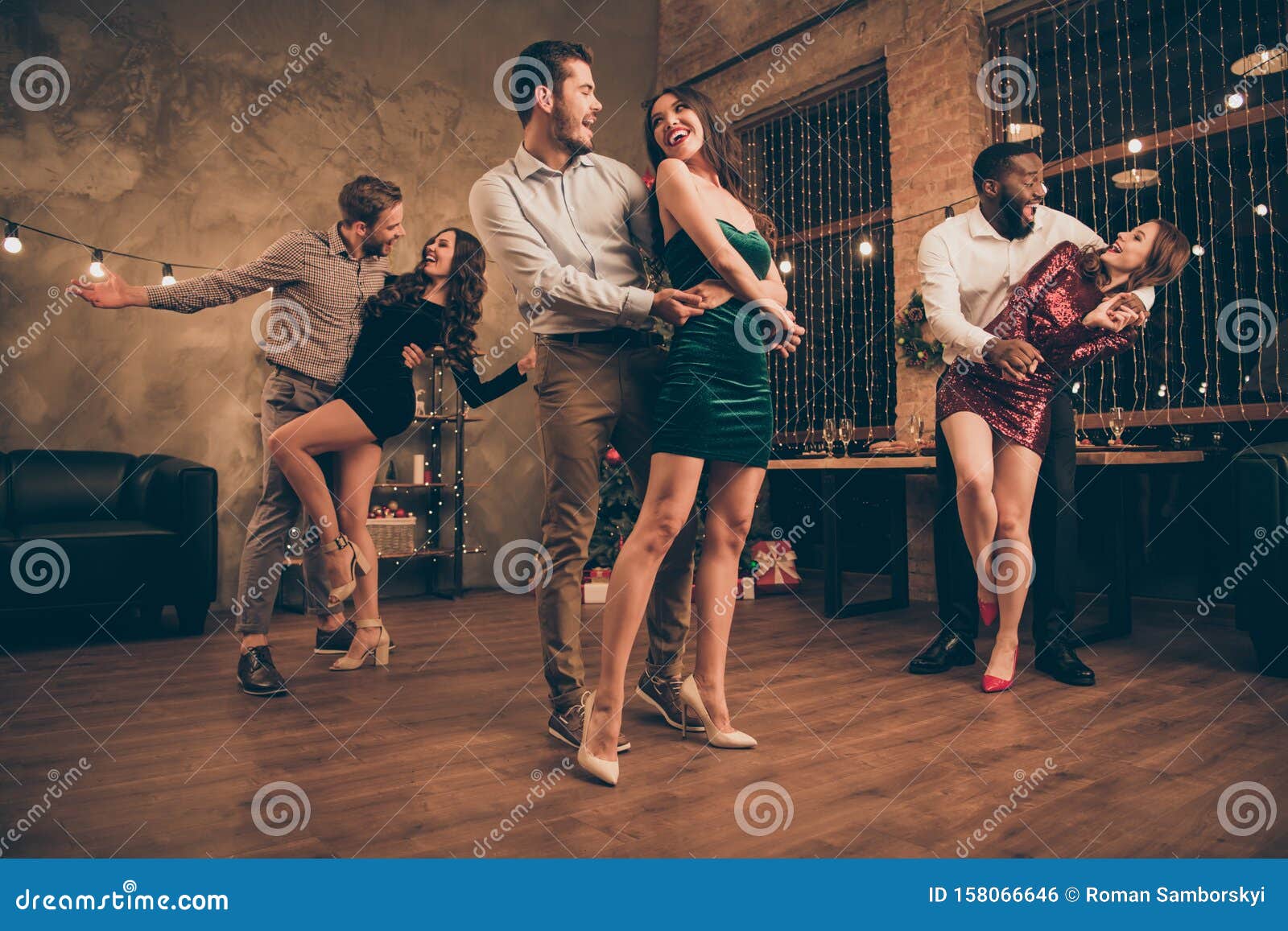 Full Body Low Angle Photo Of Cheerful Men And Women Dance Celebrate Christmas Time X Mas Party 
