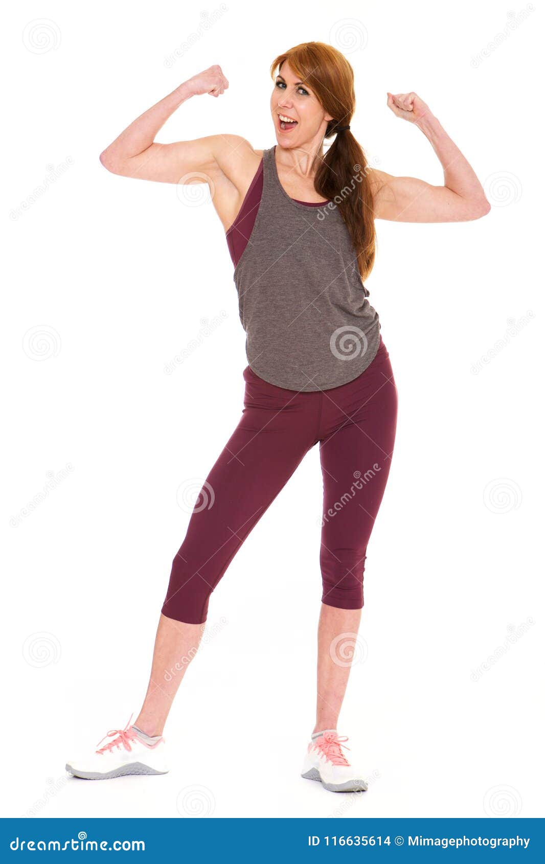 Fit Mature Woman Flexing Her Biceps Stock Photo Image Of