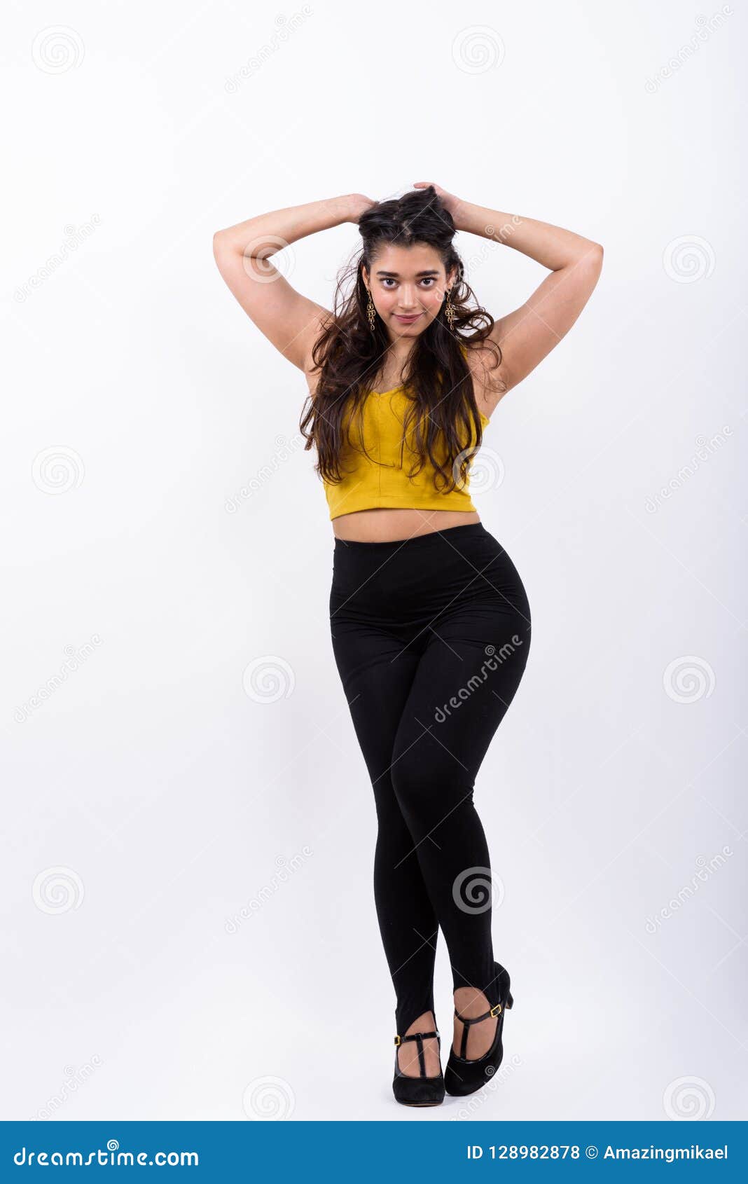 Beautiful Indian Woman Posing Over Blurred Background Stock Photo, Picture  and Royalty Free Image. Image 101599599.