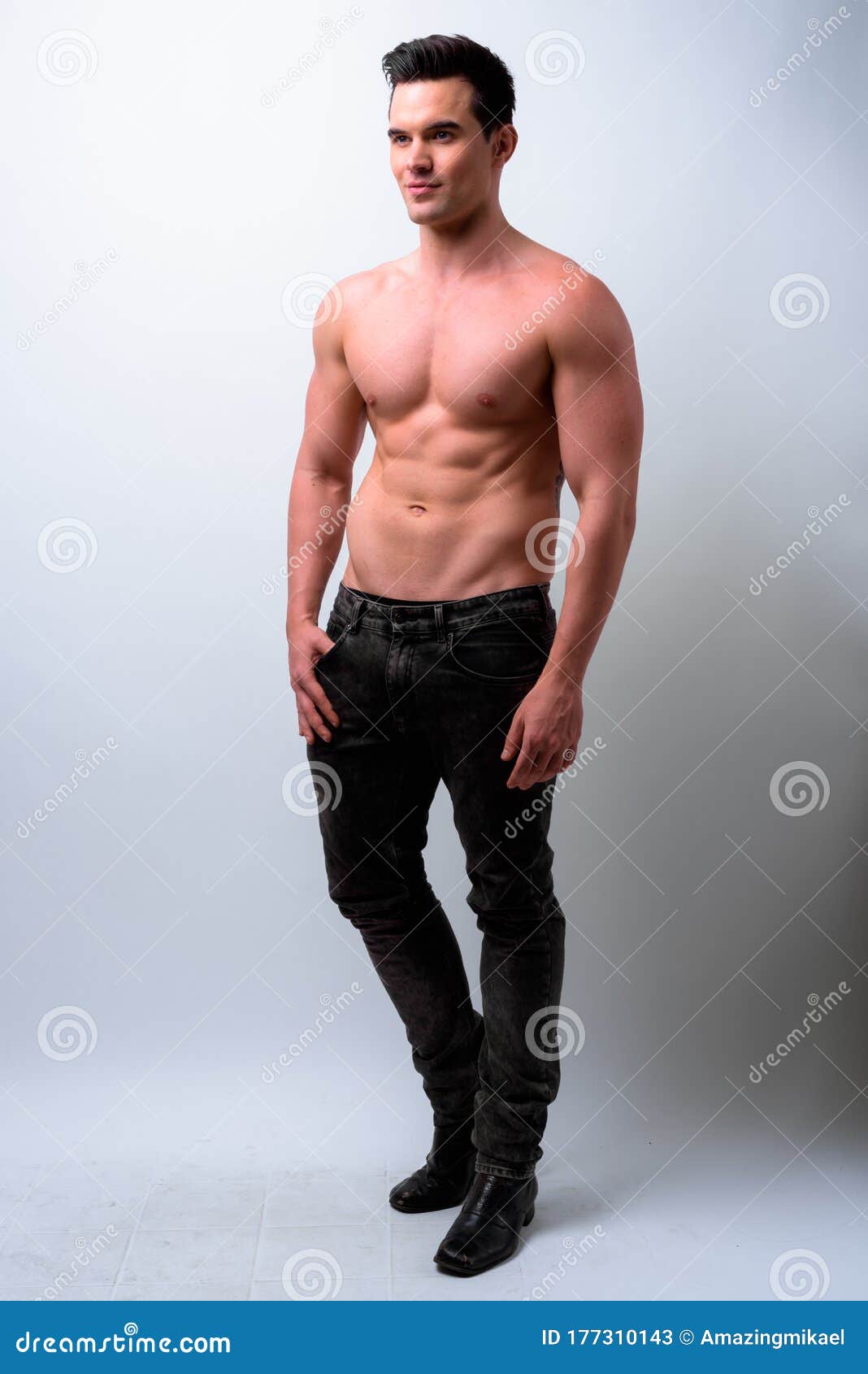 Handsome Muscular Men Exercise At The Gym Stock Photo 