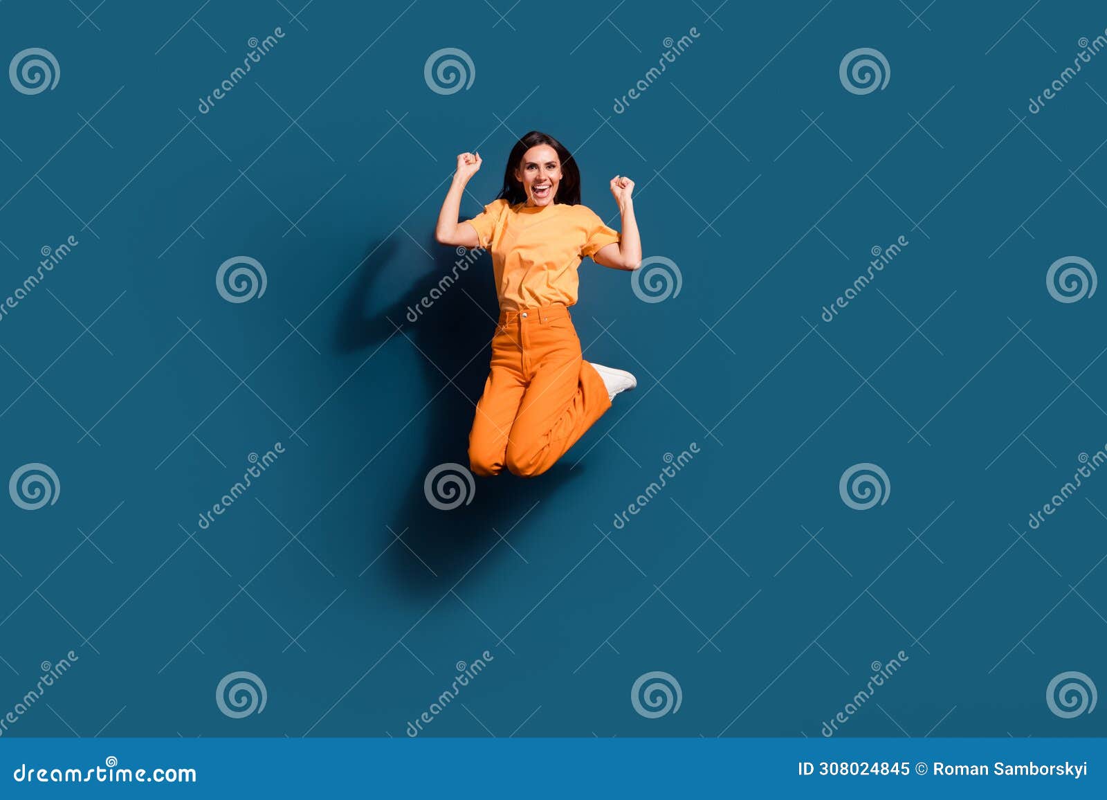 Full Body Size Photo of Sporty Woman Jumper Wearing Total Orange Look ...