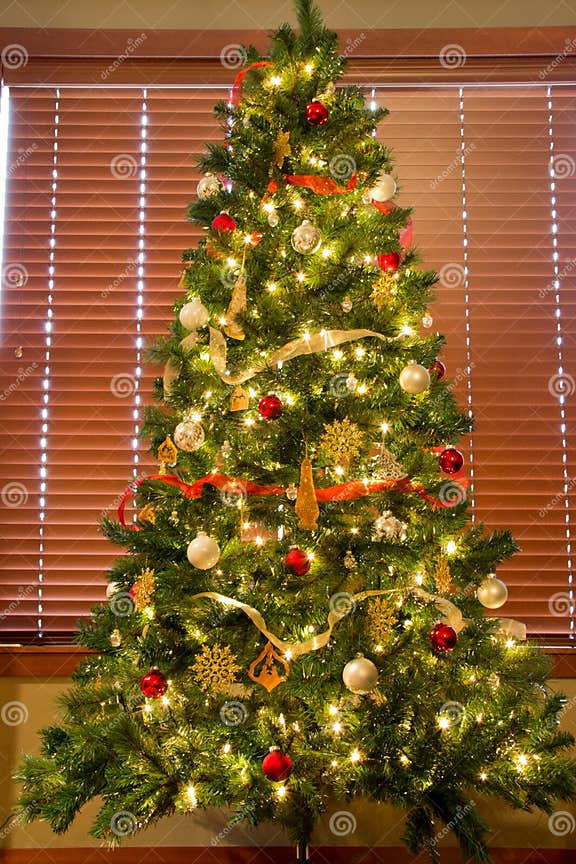 Full Christmas Tree in Front of Blinds Stock Image Image of claus