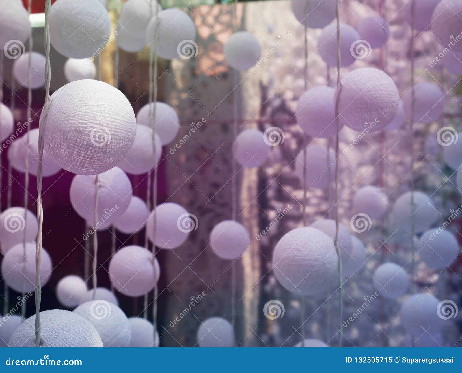 Full Frame Background of Hanging White Decorative Balls with Selective