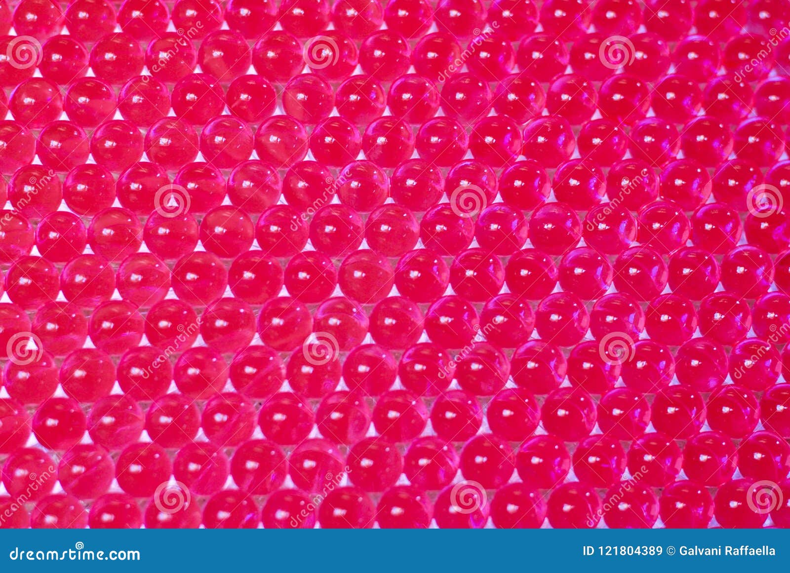 full frame of pink hydrogel rows of balls, abstract background