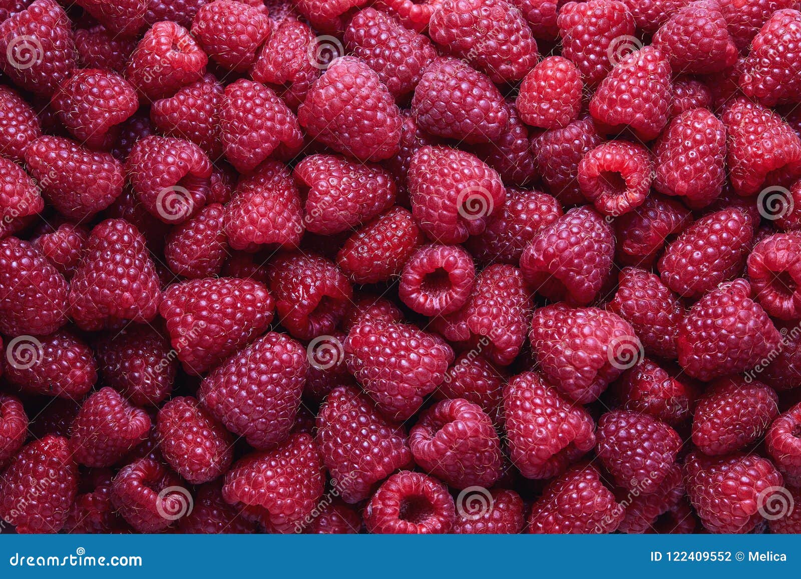 full frame shot of raspberries.