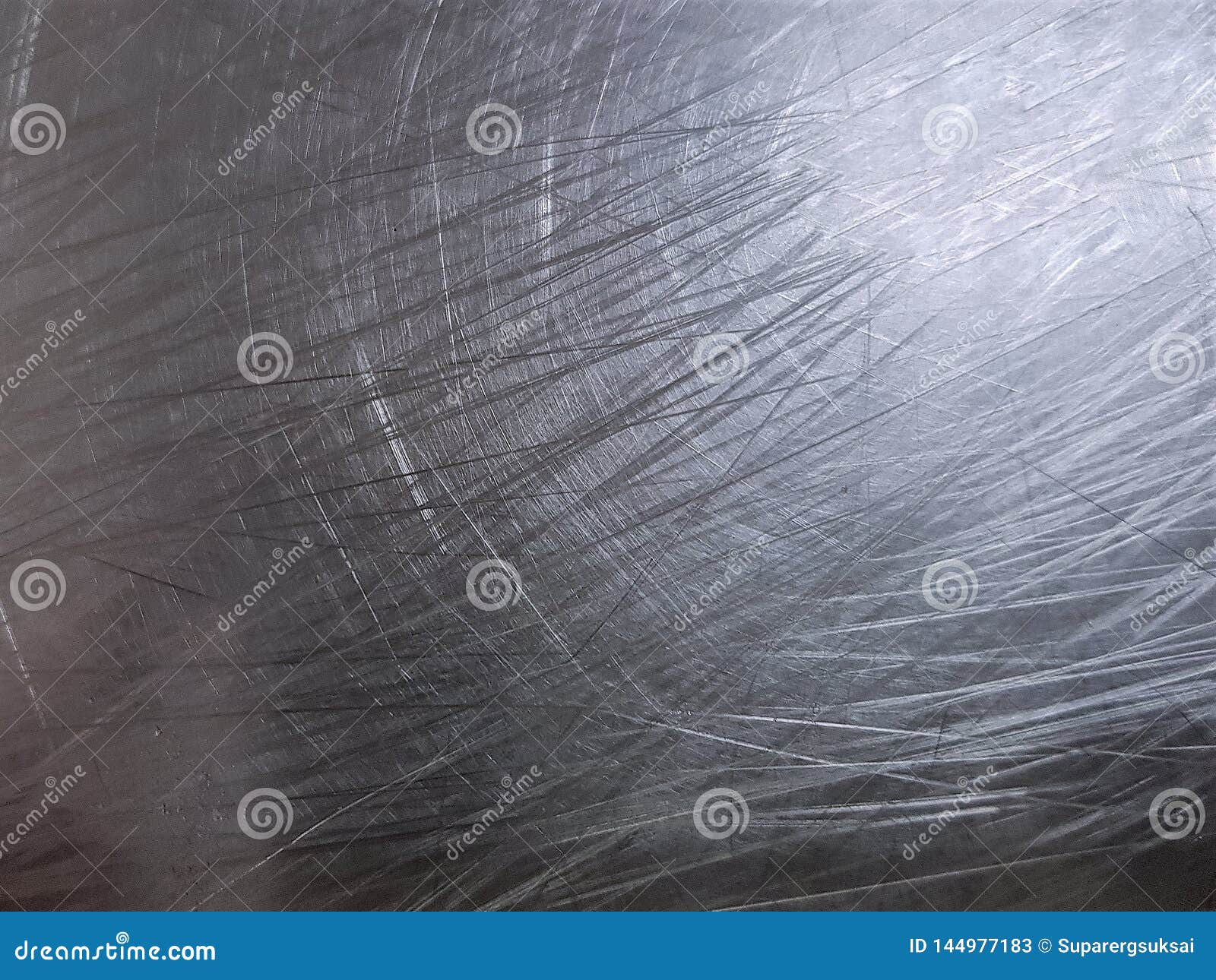 Texture Background of Circular Scratches on Stainless Steel Plate Stock