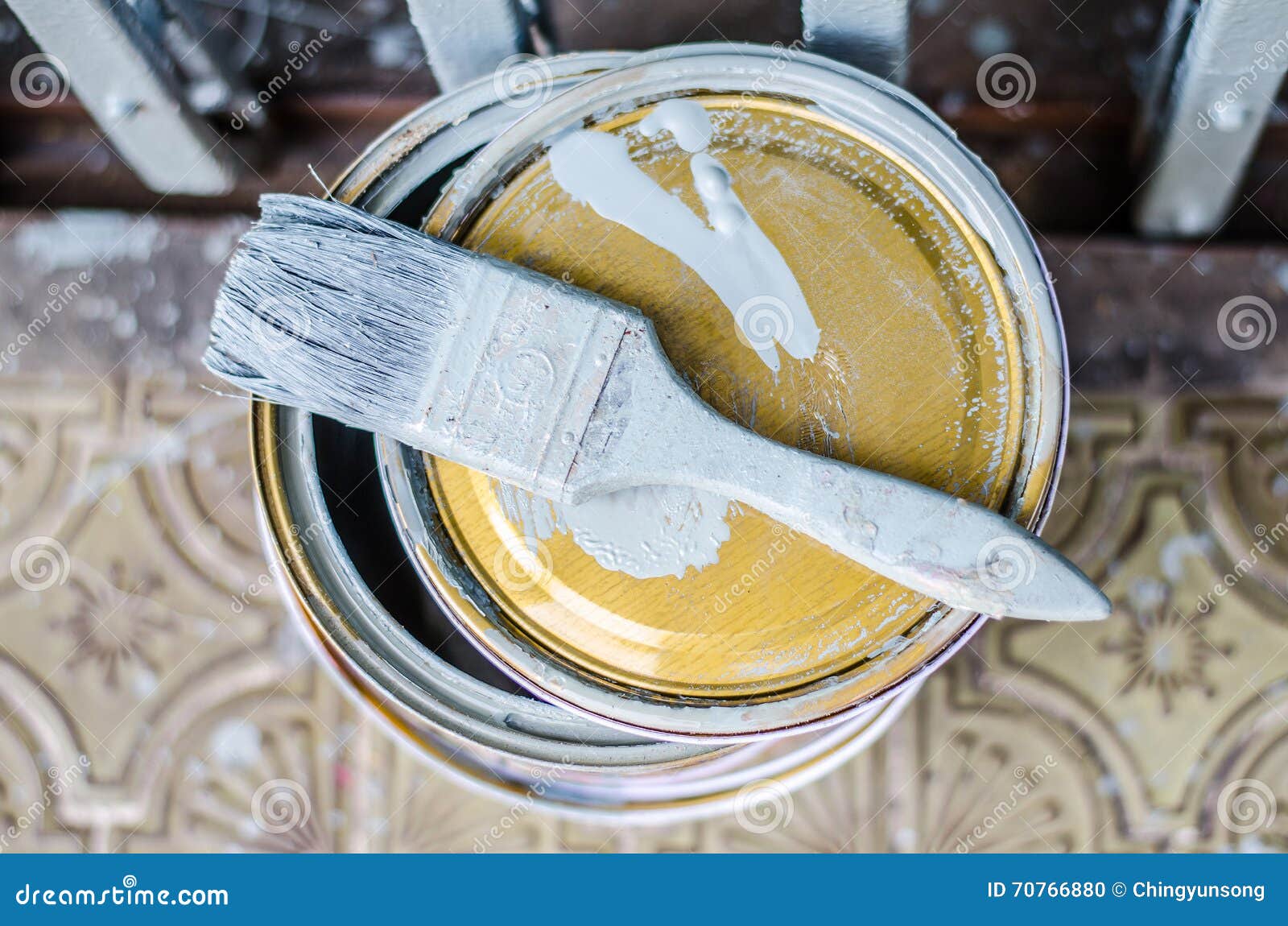 Full of Grey Paint Tin and Old Used Paintbrushes on it, Stock Photo