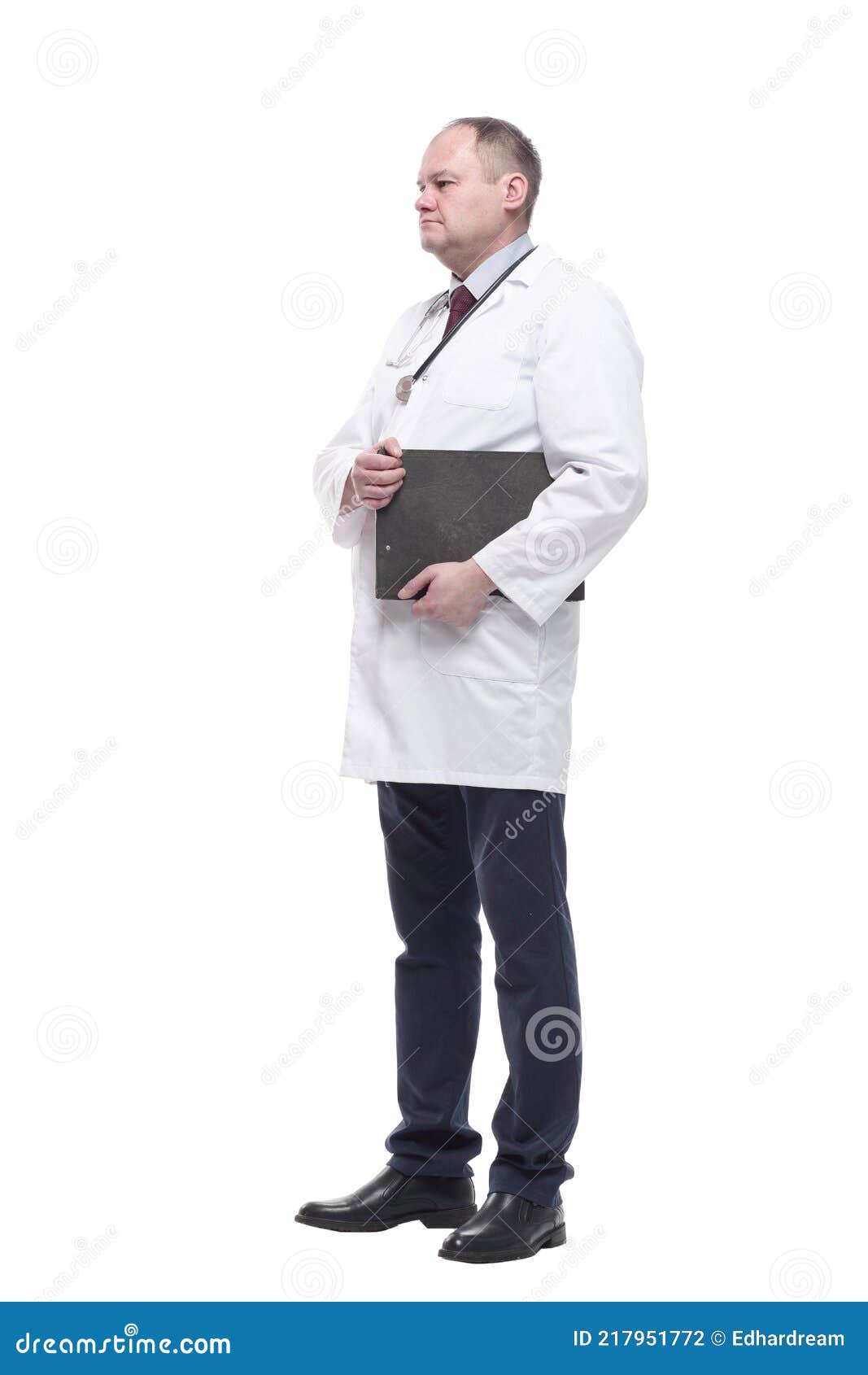 In Full Growth. Qualified Doctor with Clipboard . Stock Photo Image