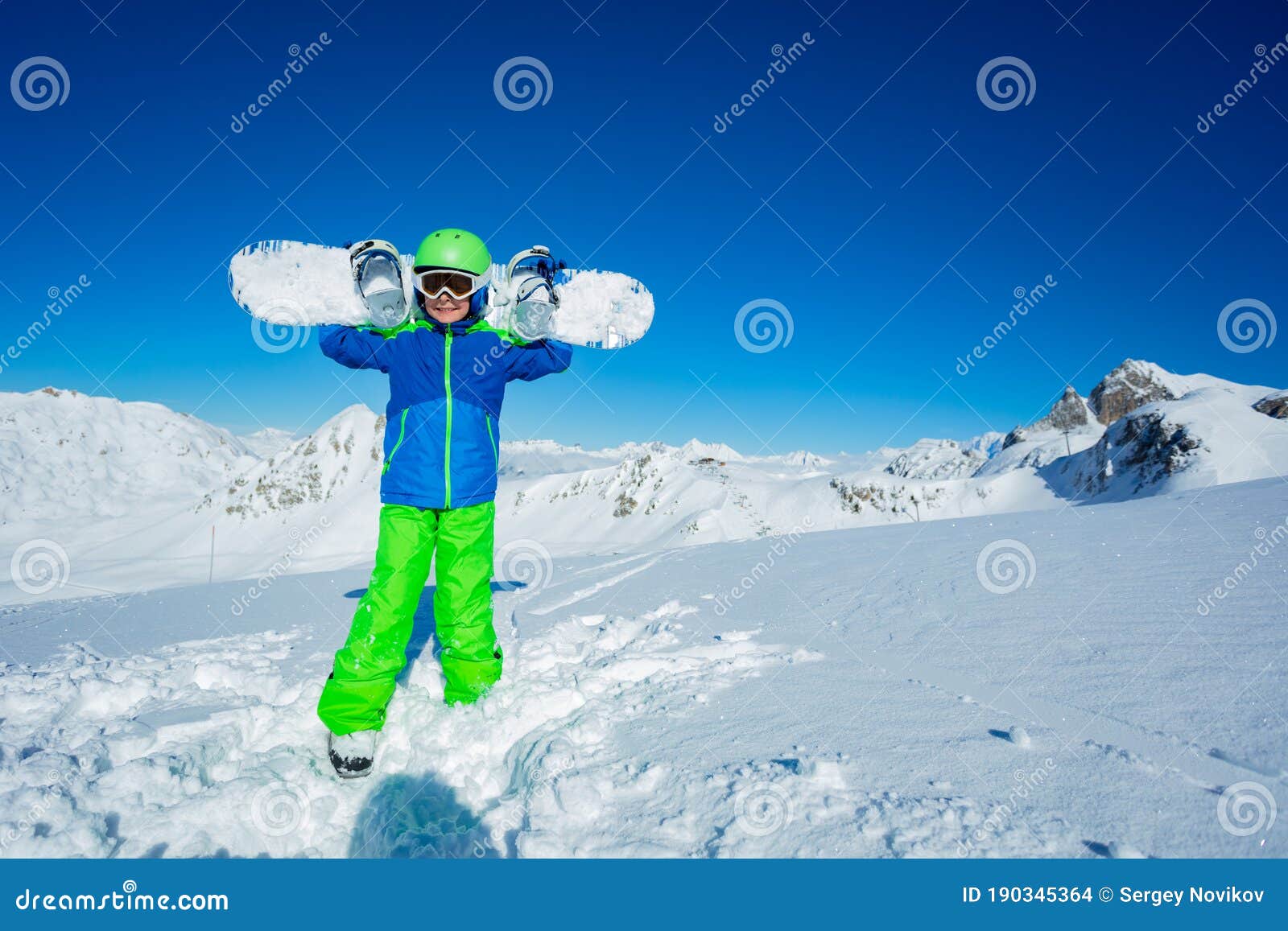 Full Height Portrait Of A Boy Hold Snowboard Stock Photo - Image of ...