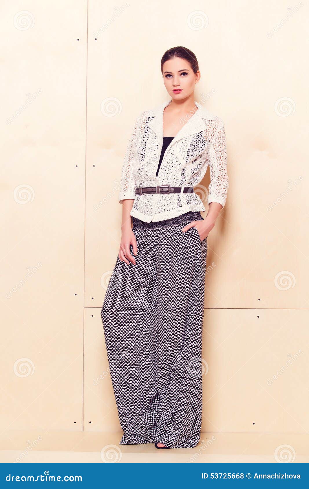 Full Height Portrait Of A Young Woman In Pantsuit Stock Photo - Image ...