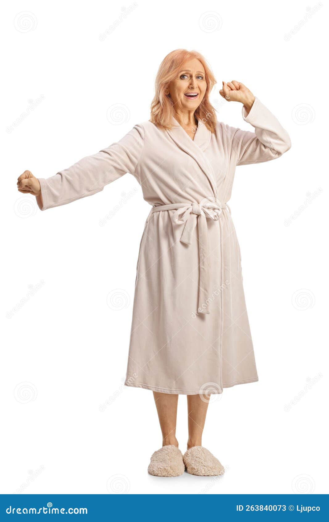 Full Lenght Shot Of A Mature Woman In A Bathrobe Stretching And Yawning Stock Image Image Of