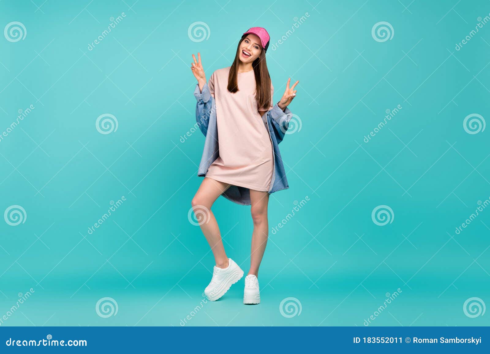 full length bdy size view of her she nice-looking attractive lovely cheerful cheery straight-haired girl showing v-sign