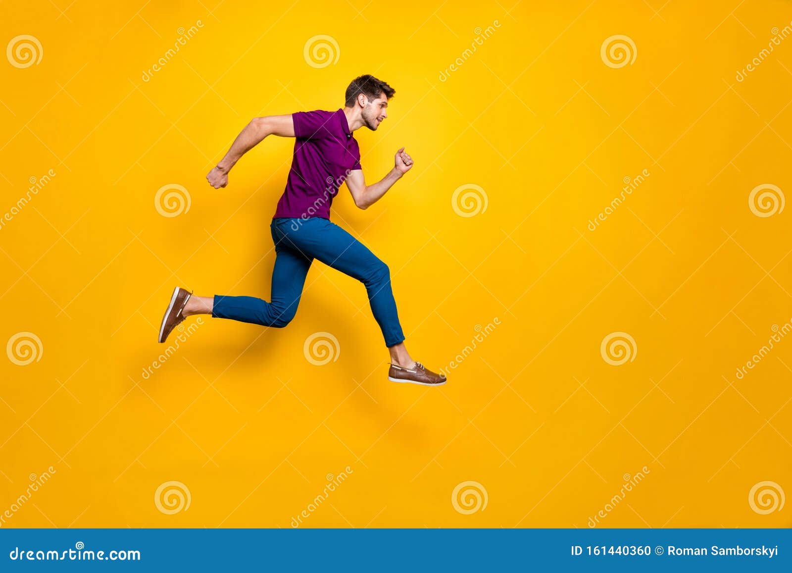 full length body size side profile photo of fast quick handsome man wearing blue pants trousers footwear running jumping