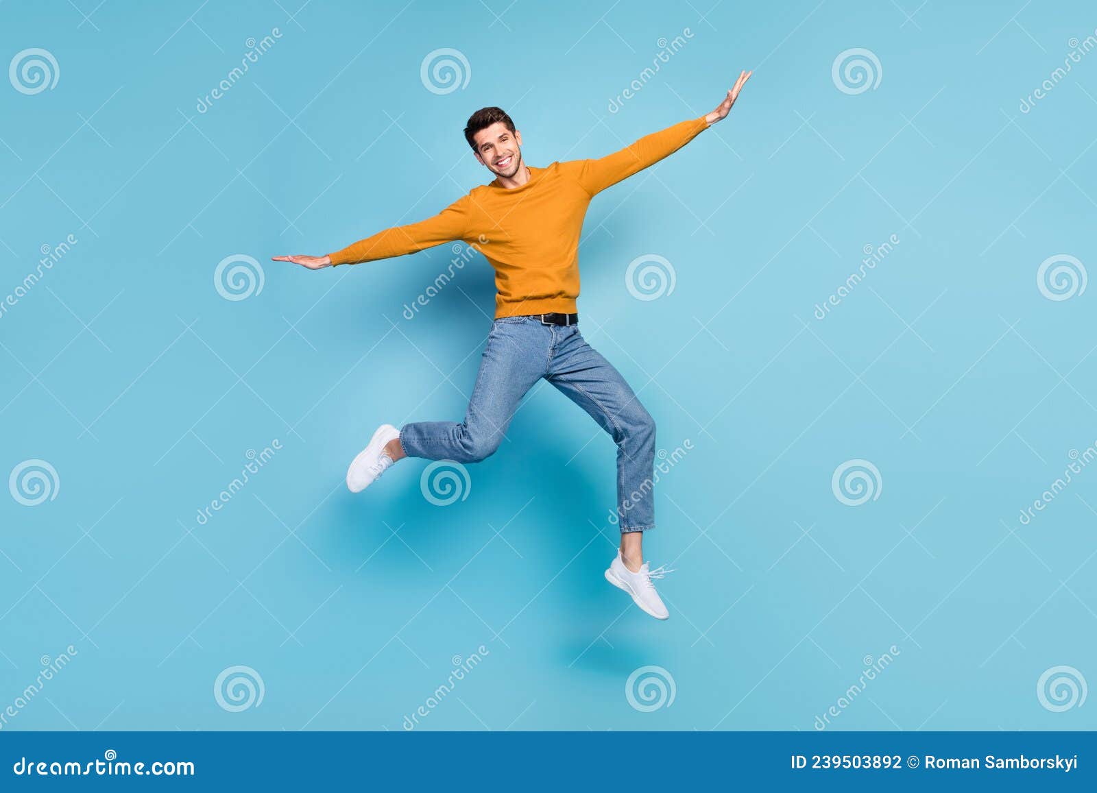 Full Length Body Size View of Attractive Cheerful Lucky Guy Jumping ...