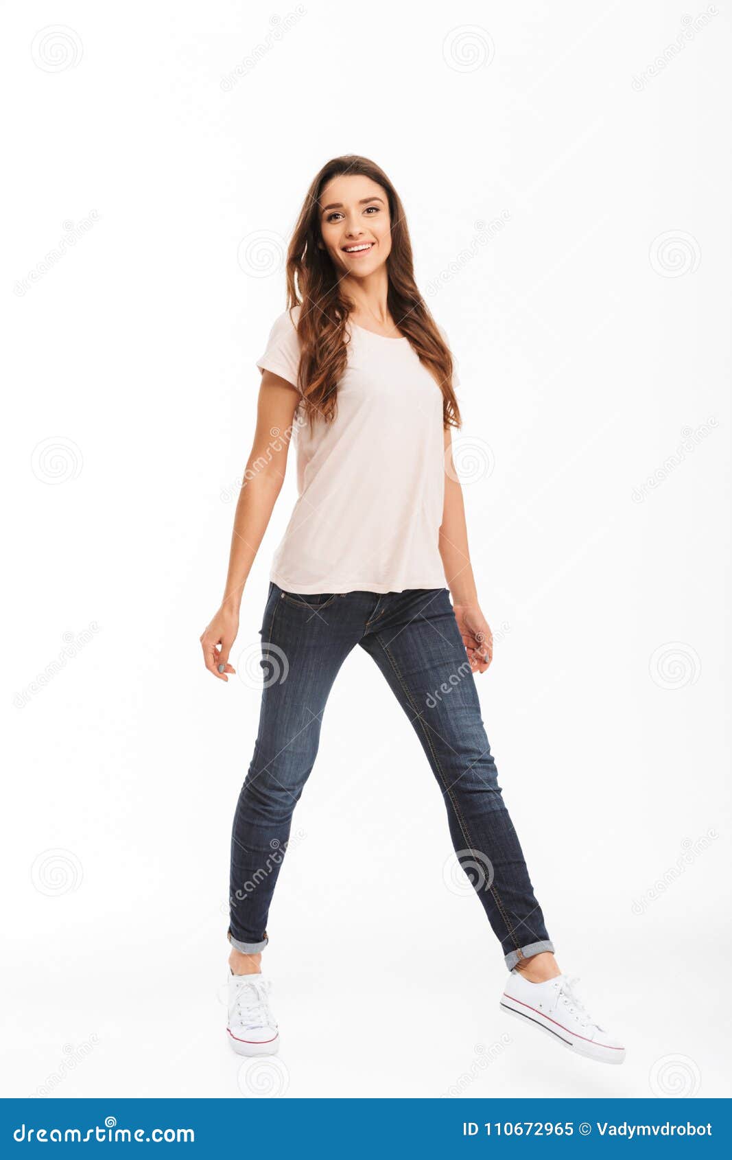 Full Length Image of Smiling Brunette Woman in T-shirt Walking Stock ...