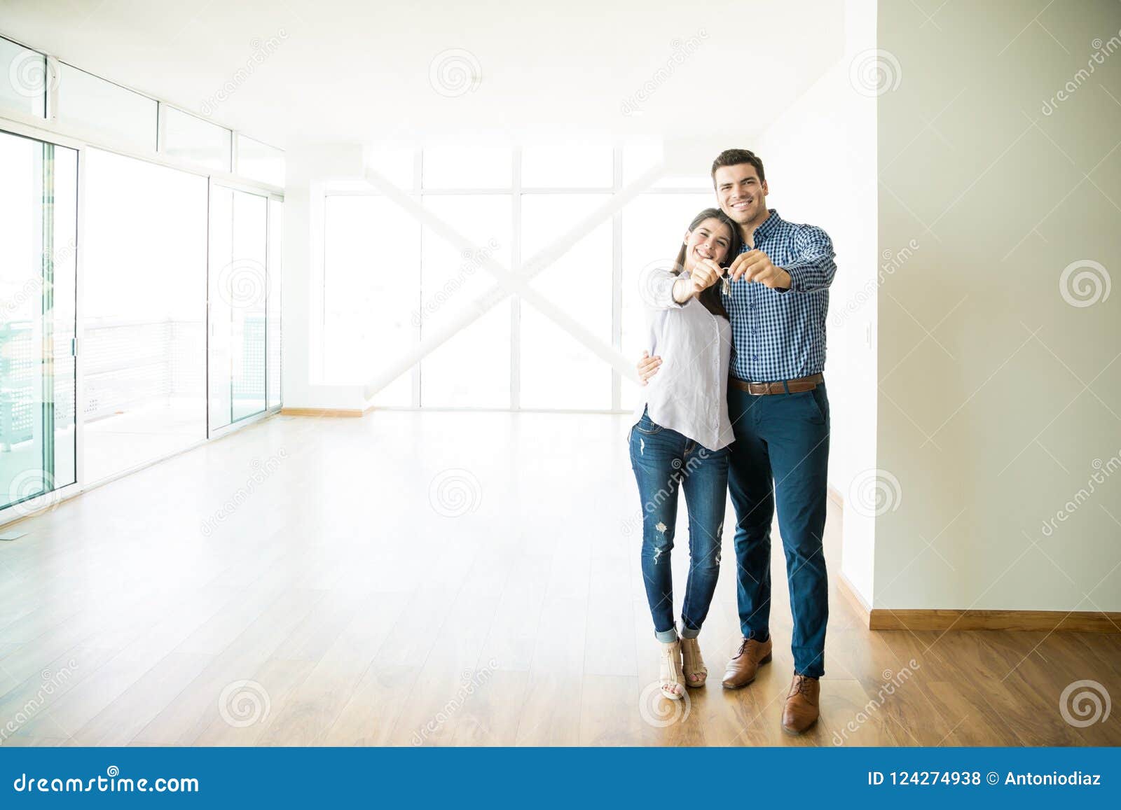 couple feeling happy about buying new house