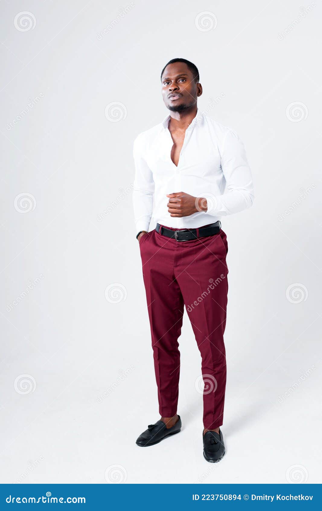 Photo of a Man in a Black Shirt Posing with His Hands in His Pockets · Free  Stock Photo