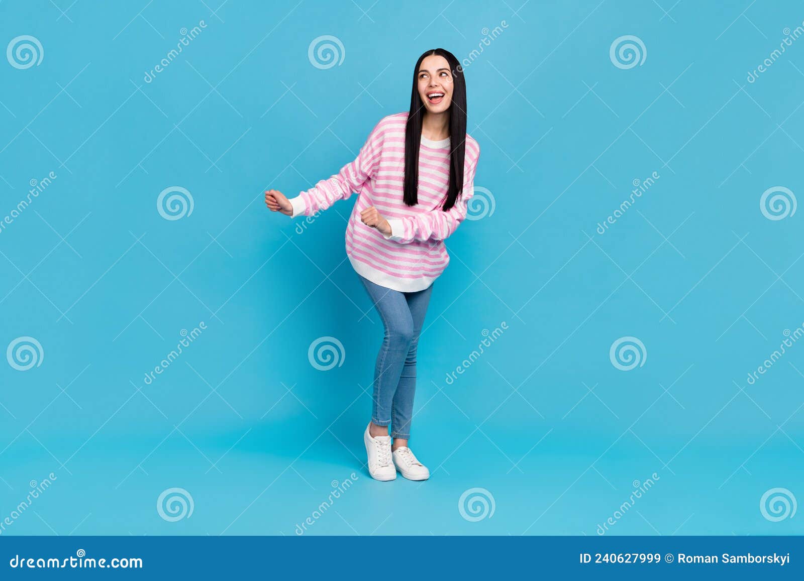 full length photo of young pretty woman have fun dance chill look empty space  over blue color background