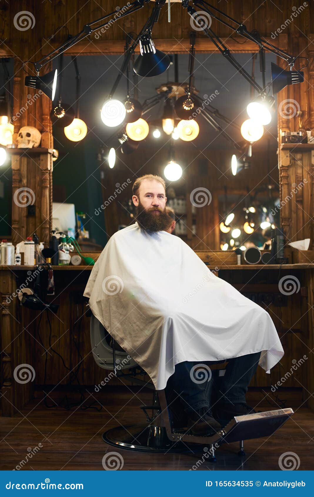Male Client with Beard Sitting in Hairdresser Chair. Serious Man with ...