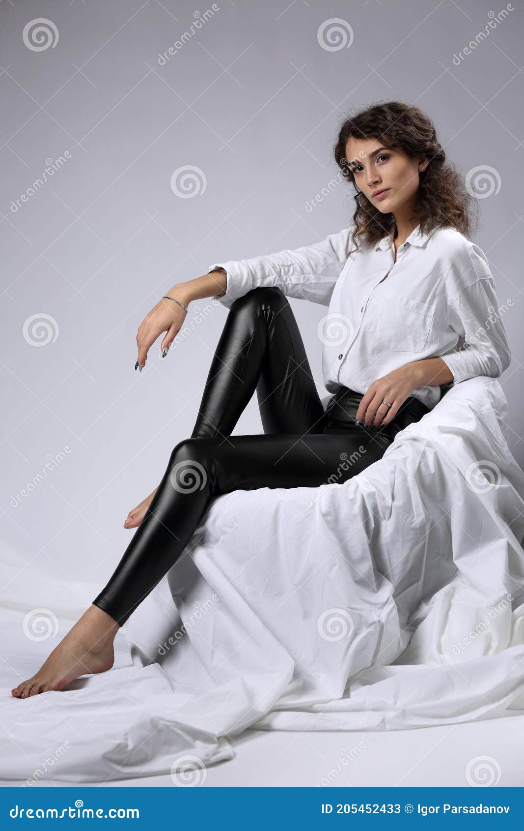 https://thumbs.dreamstime.com/z/full-length-portrait-beautiful-girl-white-shirt-black-leggings-light-background-girl-white-blouse-205452433.jpg