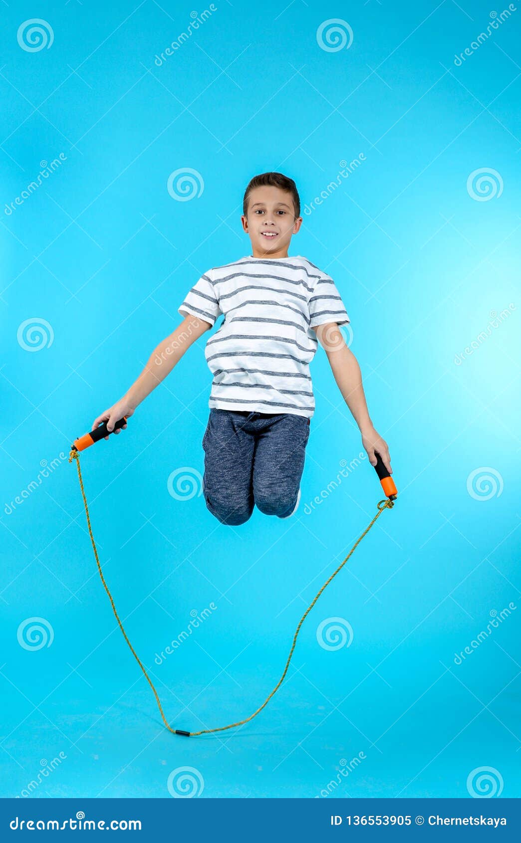 Full Length Portrait of Boy Jumping Rope Stock Image - Image of person